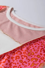 Load image into Gallery viewer, Exposed Seam Leopard Color Block Round Neck Top