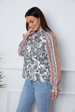 Load image into Gallery viewer, Tassel Tie Neck Printed Smocked Long Sleeve Blouse