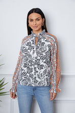 Load image into Gallery viewer, Tassel Tie Neck Printed Smocked Long Sleeve Blouse